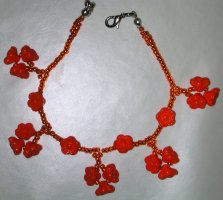 Bracciale con fiorellini arancioni