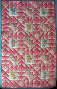 Double cross con inserti ricamati a punto croce
